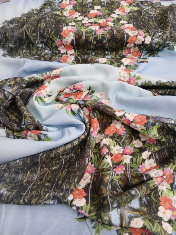 Tecido Viscose Estampada Coqueiros Azul Claro • Conexão Tecidos