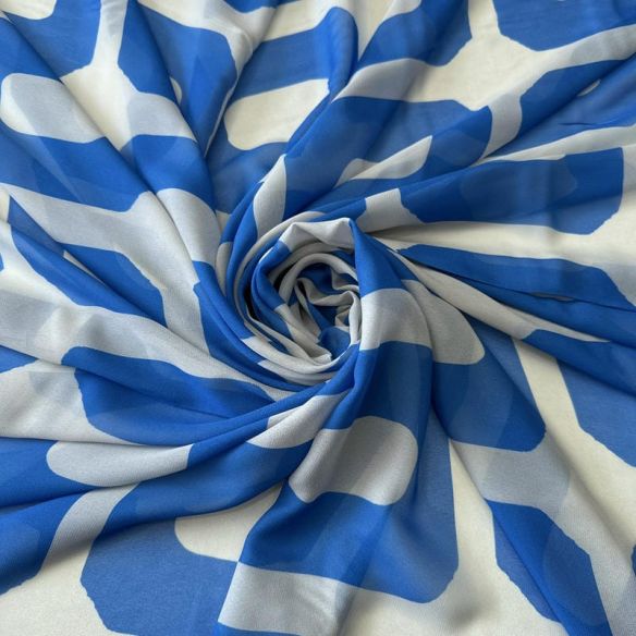 Tecido Musseline de Viscose Estampada Elos Azul • Conexão Tecidos