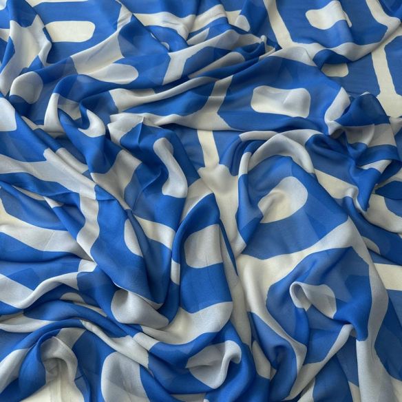 Tecido Musseline de Viscose Estampada Elos Azul • Conexão Tecidos