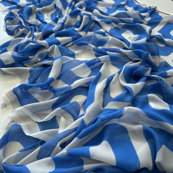 Tecido Musseline de Viscose Estampada Elos Azul • Conexão Tecidos