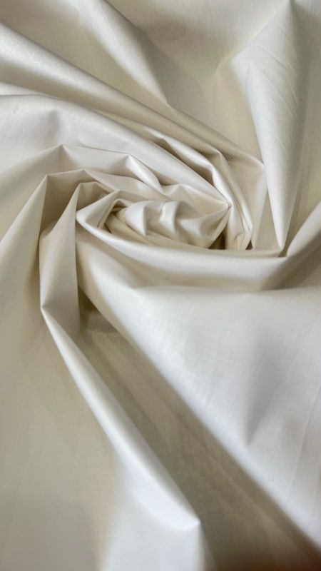 Tecido Cambraia de Algodão Acetinada Off White • Conexão Tecidos