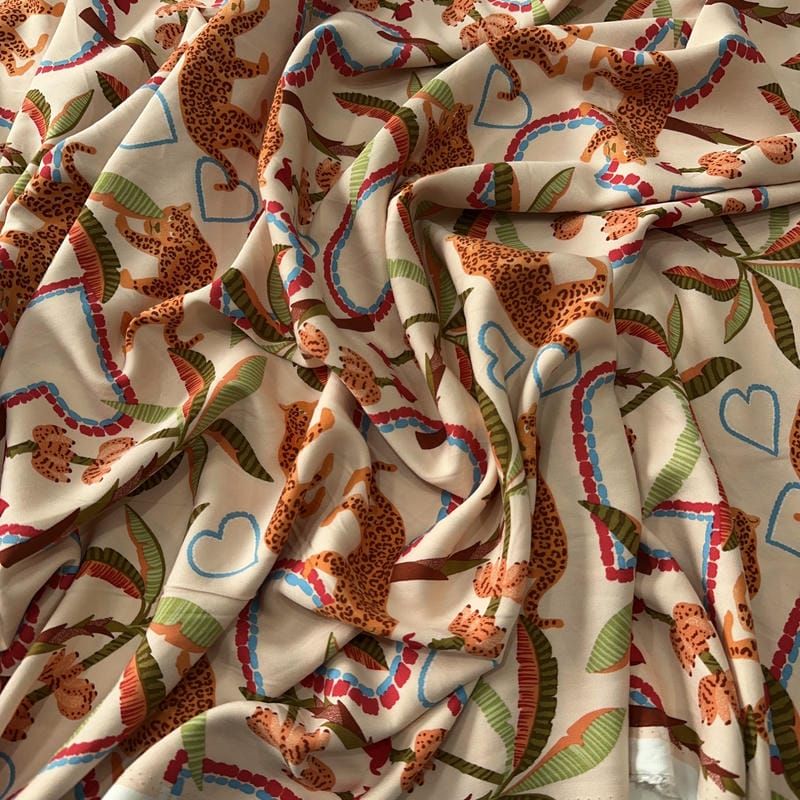 Tecido Viscose Estampada Onças Jardim Tropical Areia • Conexão Tecidos