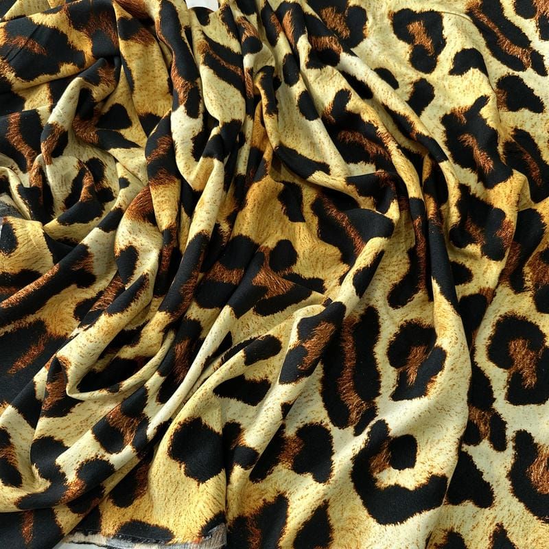 Tecido Viscose Estampada Onça Clássica Caramelo • Conexão Tecidos