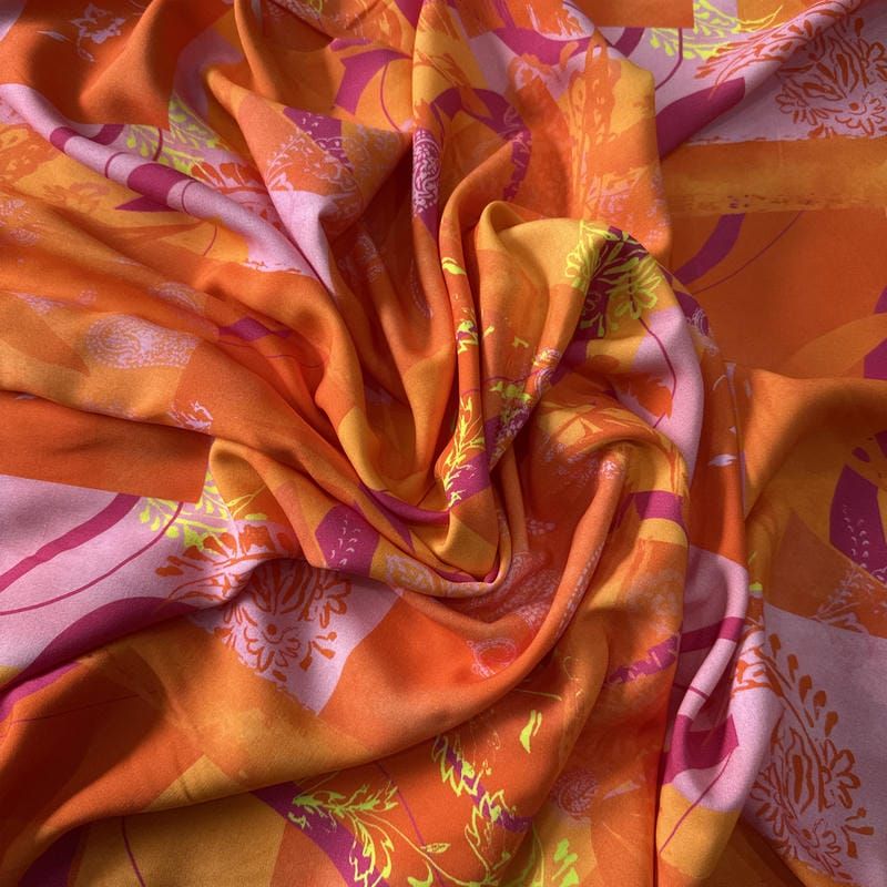 Tecido Viscose Estampada Paisley Solar Laranja e Lilás • Conexão