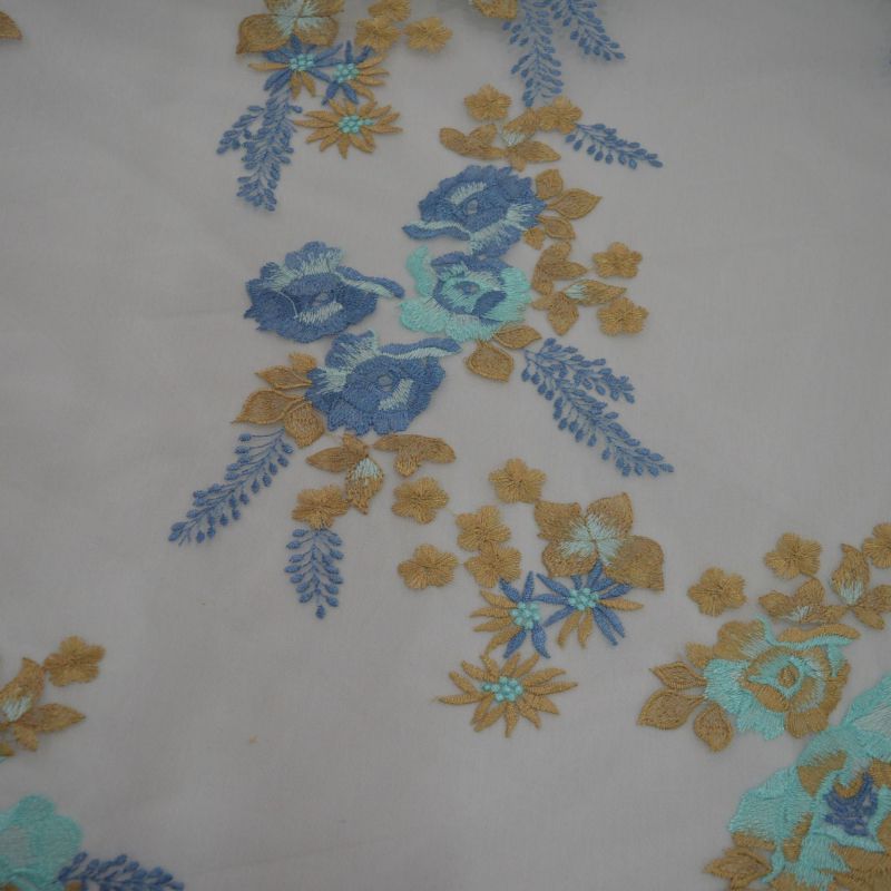 Tecido Tule Bordado Dourado E Azul • Conexão Tecidos