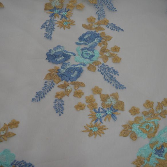 TULE BORDADO DOURADO E AZUL • Conexão Tecidos