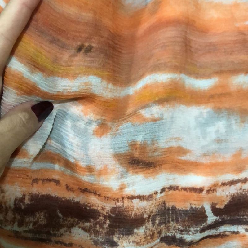 TECIDO CHIFFON DE SEDA TIE DYE LARANJA • Conexão Tecidos