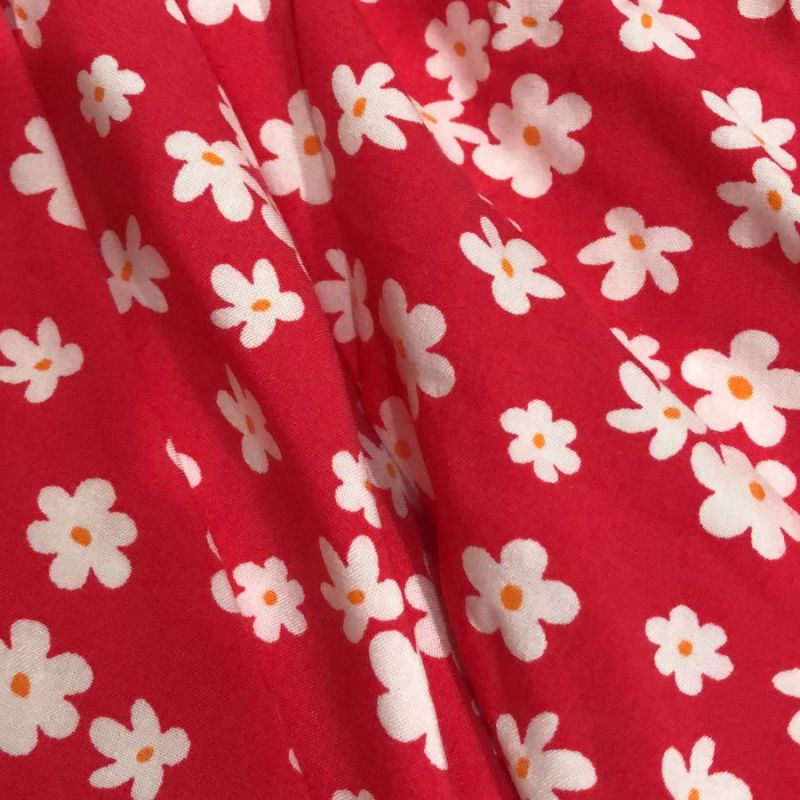 Tecido Viscose Vermelha com Margaridas - Conexão Tecidos