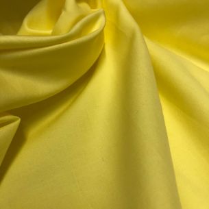 Tecido Tricoline Liso Amarelo Acetinado • Conexão Tecidos