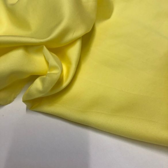 Tecido Tricoline Liso Amarelo Acetinado • Conexão Tecidos