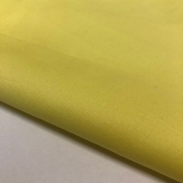 Tecido Tricoline Liso Amarelo Acetinado • Conexão Tecidos