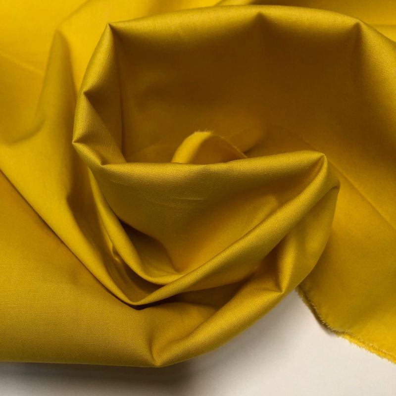 Tecido Tricoline Liso Amarelo Gema • Conexão Tecidos