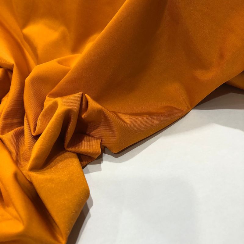 Tecido Malha Fluity Laranja • Conexão Tecidos