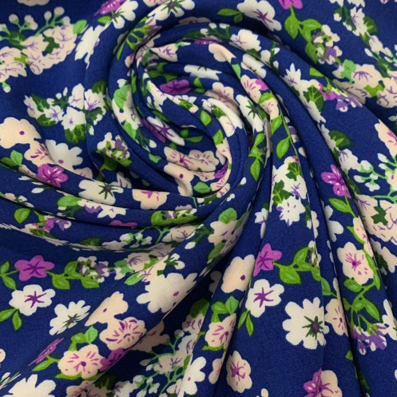 Tecido de Viscose Florais Pequenos Azul Roial. 