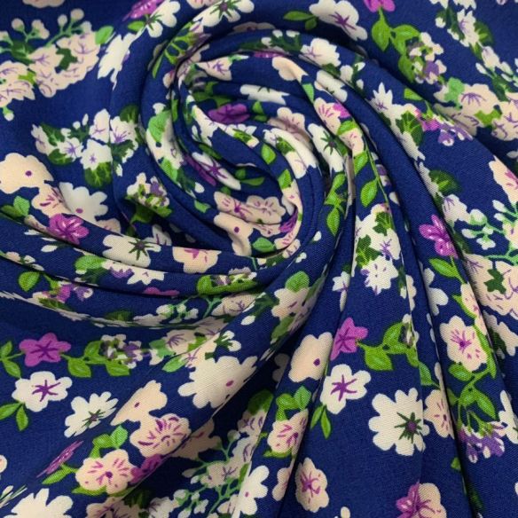 Tecido de Viscose Florais Pequenos Azul Roial. 