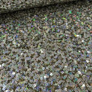 Tecido Paetê Eclipse de Prata • Conexão Tecidos