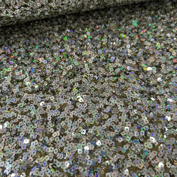 Tecido Paetê Eclipse de Prata • Conexão Tecidos