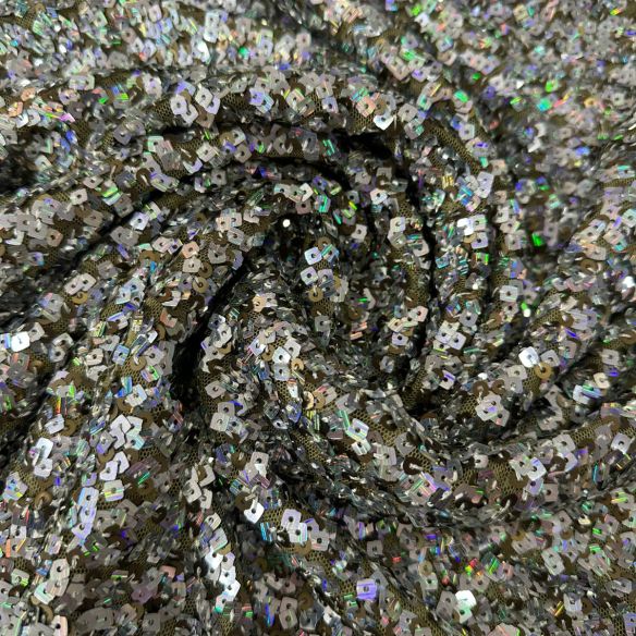 Tecido Paetê Eclipse de Prata • Conexão Tecidos