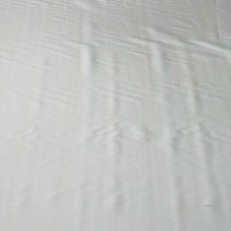 Tecido Eleganza Seda Misto Off White • Conexão Tecidos